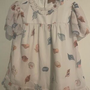 JessaKae Seashell Print top with Ruffle Detail